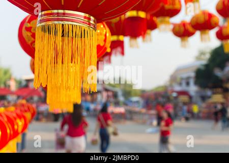 Chinese lanterns season in new year celebration.Decorating hanging Chinese lantern lamps. Stock Photo