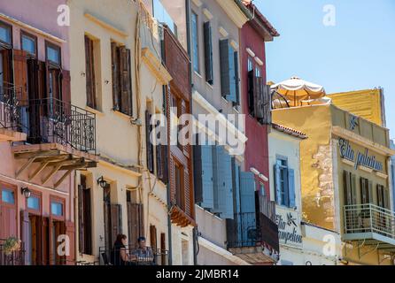 typically greek traditional colourful buildings and architecture on the mediterranean island of crete, historic heritage greek buildings on the island Stock Photo