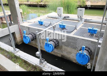 Big pipe for drain water from pump for flood protecting. Stock Photo