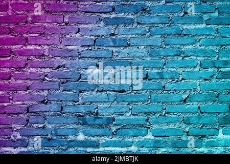 Colorful painted brick wall texture background. Graffiti brick wall, colorful background. Stock Photo
