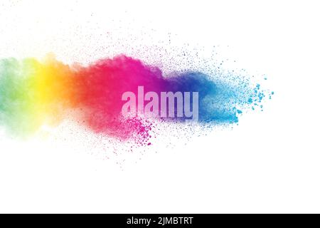 Colorful powder explosion on white background. Abstract pastel color dust particles splash. Stock Photo