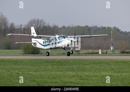 Single-engine business airplane during take off Stock Photo