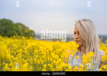 Vintage style portrait of a young blond woman Stock Photo