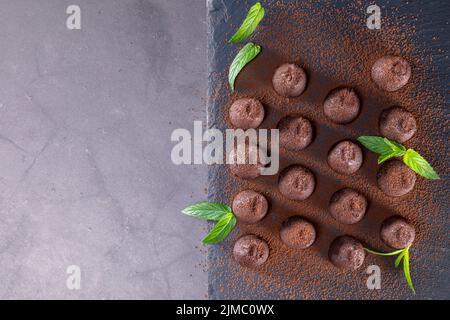 Top view of chocolate truffles powdered with cocoa Stock Photo