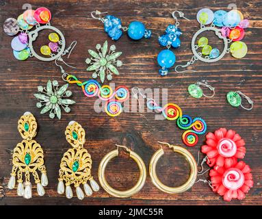 Costume jewelry for women. Various types of earrings. Stock Photo