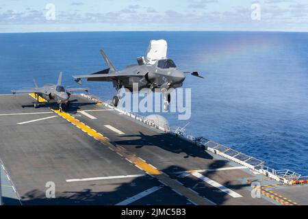 Pacific Ocean, United States. 04th Aug, 2022. A U.S. Marine Corps F-35B Lightning II aircraft assigned to Marine Medium Tiltrotor Squadron 262, lands on the flight deck of the Wasp-class amphibious assault ship USS Tripoli, August 4, 2022 operating on the Pacific Ocean. Credit: MC2 Malcolm Kelley/U.S. Marines Photo/Alamy Live News Stock Photo