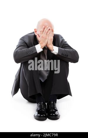 Crying tired or stressed businessman in depression hand hiding face Stock Photo