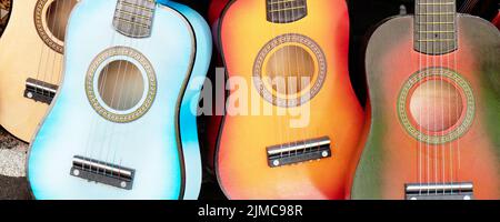Background with hawaiian guitars ukulele Stock Photo