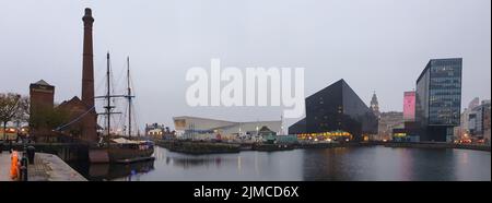 Panoramic capture of  the Liverpool Docks, Port of Liverpool, late on a cloudy afternoon, with modern and classic architecture i Stock Photo