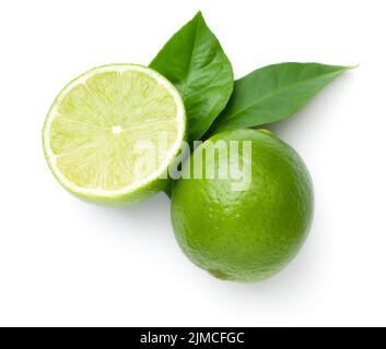 Limes With Leaves Isolated On White Background Stock Photo