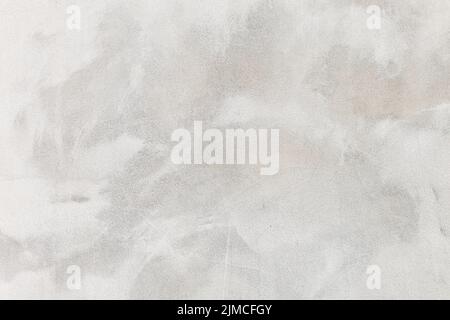 White washed painted concrete wall texture abstract background with brush strokes in gray and black shades. Stock Photo