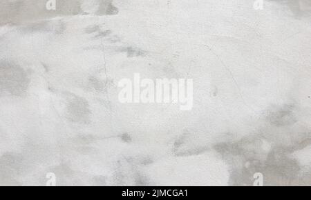 Concrete wall with whitewashed layer texture background. Stock Photo