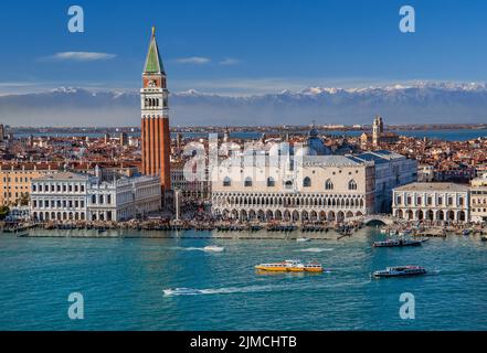 Waterfront on the lagoon with Piazzetta, Campanile and Doge's Palace in front of the Alpine chain, Venice, Veneto, Adriatic Sea, Northern Italy, Italy Stock Photo