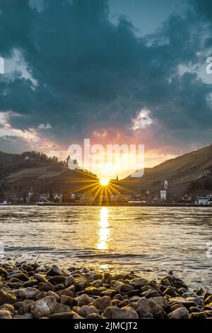 Sunset over the Rhine and the town panorama ofi Bacharach am Rhein, UNESCO World Heritage Upper Middle Rhine Valley, Rhineland-Palatinate, Germany Stock Photo