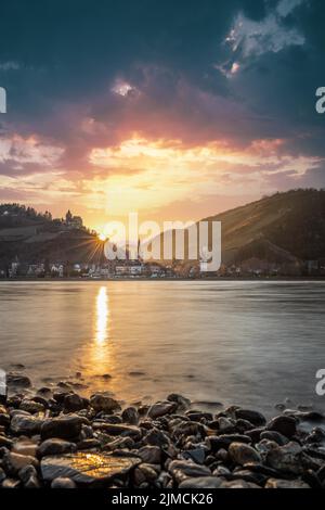 Sunset over the Rhine and the town panorama ofi Bacharach am Rhein, UNESCO World Heritage Upper Middle Rhine Valley, Rhineland-Palatinate, Germany Stock Photo