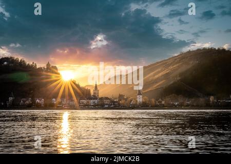 Sunset over the Rhine and the town panorama ofi Bacharach am Rhein, UNESCO World Heritage Upper Middle Rhine Valley, Rhineland-Palatinate, Germany Stock Photo