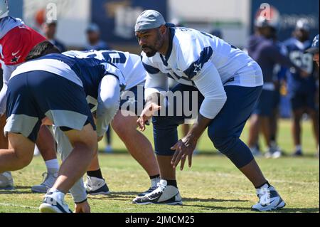 Dallas Cowboys tackle Tyron Smith (77) blocks for wide receiver Cole  Beasley (11) against the New York Giants on Sunday, Sept. 13, 2015, at AT&T  Stadium in Dallas. (Photo by Richard W.