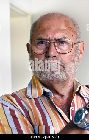 Angry, grumpy looking old man, Allgaeu, Bavaria, Germany Stock Photo