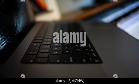 A powerful, new M1 MacBook Pro 16 inch keyboard. Stock Photo