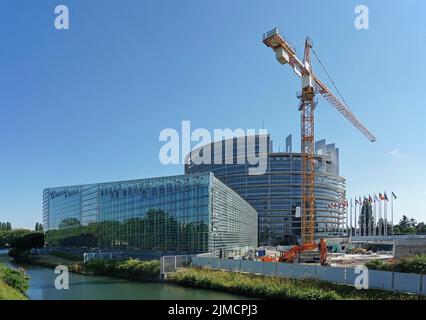 Construction crane on building site, European Parliament, Strasbourg, France Stock Photo