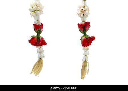 Colorful Thai garland flower from red roses,White Champaka,Dahlia and Jasmine flowers on white background Stock Photo