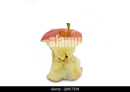 Ripe red apple core after Bitten on white background Stock Photo