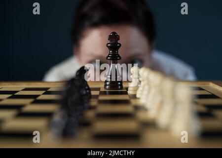 Symbol image, desperation, success, confusion, strategy, woman with a chess set Stock Photo