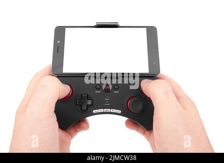 Video game controller in hands isolated on white background Stock Photo