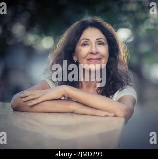 Outdoor portrait of a beautiful senior woman Stock Photo