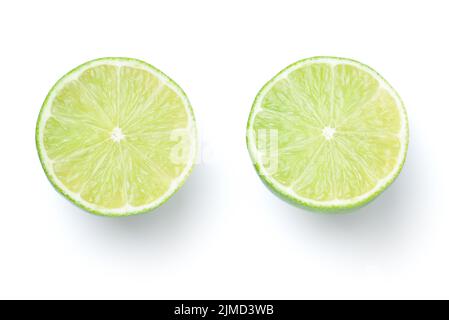 Sliced Limes Isolated On White Background Stock Photo