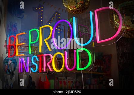 Be Proud In Stroud, LGBTQ support in Stroud town centre, Gloucestershire, England, UK - neon sign Stock Photo