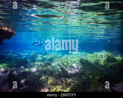 Practicing diving and snorkeling, mysterious lagoon, beautiful lagoon of transparent turquoise blue Stock Photo