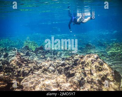 Practicing diving and snorkeling, mysterious lagoon, beautiful l Stock Photo