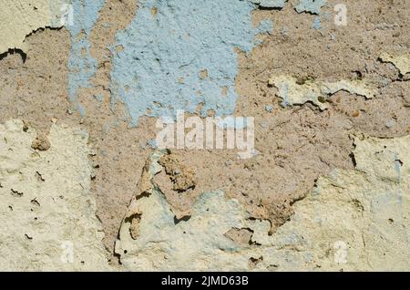 Wall with peeling paint, paint problem. Inadequate paint system, water infiltration. Stock Photo