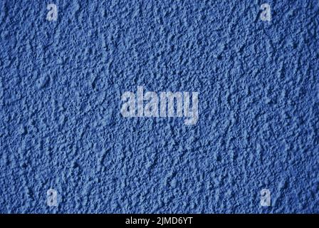 Rough unsmooth dark blue wall texture Stock Photo