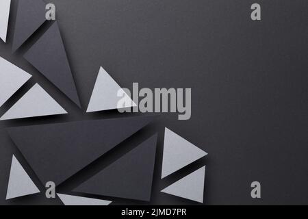 Abstract Composition Over Black Paper Background Stock Photo