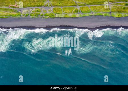 Aerial top view of beach with black sand Stock Photo