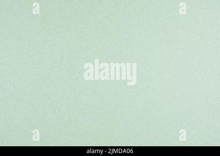 Green Fabric Material Textile. Abstract Textured Design Background. Suitable for Backdrop, Wallpaper, or Decorative Design Stock Photo