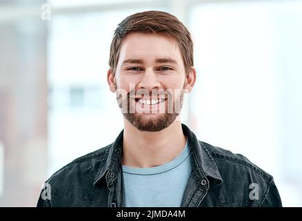 Your mind has the power to inspire positive change. Portrait of a happy young man at home. Stock Photo