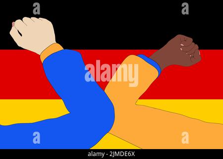 Elbow bump. New, innovative greeting to avoid the spread of the coronavirus in front of a Germany flag.