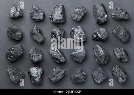 Coal Lumps Over Black Background Stock Photo