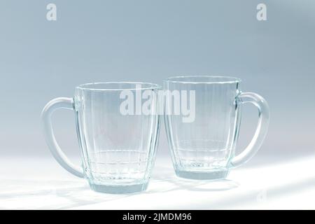 Empty beer mug on grey background. Stock Photo