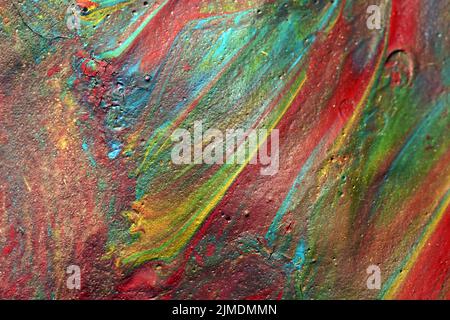 Macro shot of a mix of acrylic paint and oil on a marbled paper background Stock Photo