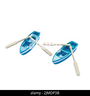 Two miniature boats with oars isolated on white. blue toy ships Stock Photo