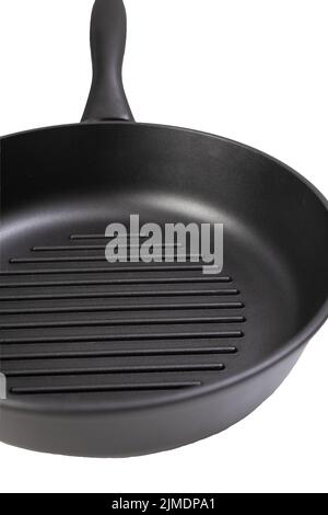 Grill pan round shape, non-stick coating and a several parallel raised ridges isolated on white background Stock Photo