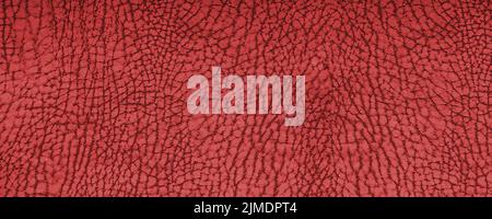 Clean red leather fullframe texture. Empty red leatherette closeup macro background Stock Photo