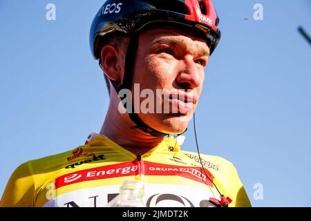 Krakow, Poland. 05th Aug, 2022. Hayter Ethan from the United Kingdom of INEOS Grenadiers team rests at Blonia Park after winning the general classification during the final 7th day of the 79. Tour de Pologne UCI World Tour. Credit: SOPA Images Limited/Alamy Live News Stock Photo