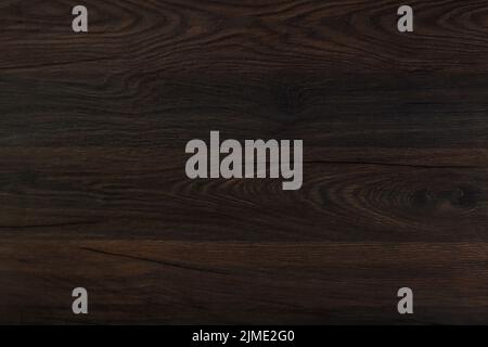 Brown wooden background. Wood dark abstract texture. Stock Photo
