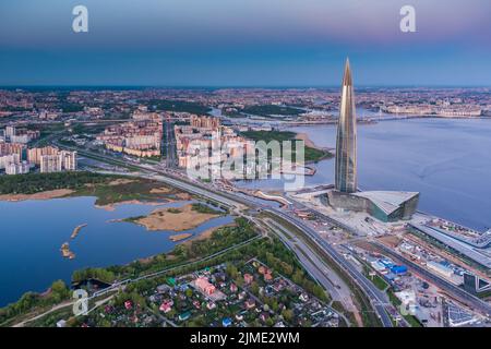Russia, St.Petersburg, 16 May 2021: Drone point of view of highest skyscraper in Europe Lakhta Center at pink sunset, Headquarte Stock Photo