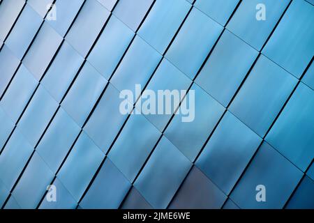 Stainless steel facade cladding on a modern building in downtown Magdeburg in Germany Stock Photo